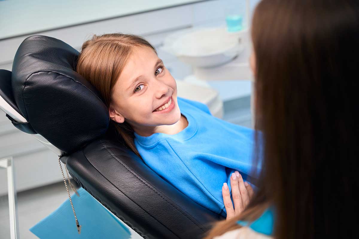 Young girl at the orthodontist.